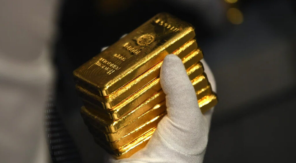 Gold Climbs Near $5,180 As Dollar Weakens
